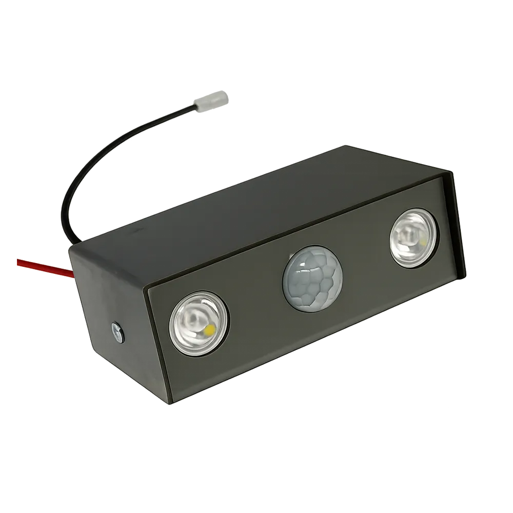 Black rectangular outdoor security light with three bays: two LEDs on the ends and a central motion sensor, wired with red and black cables